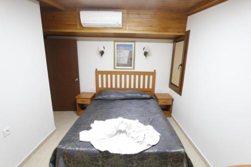 a bedroom with a bed in a room at Hotel Ave Maria in Selcuk