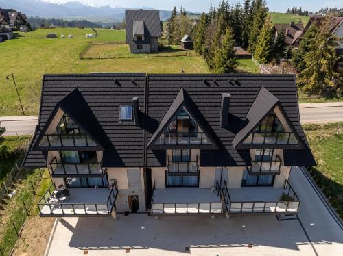 an overhead view of a house with a roof at Silent Mountain in Bukowina Tatrzańska