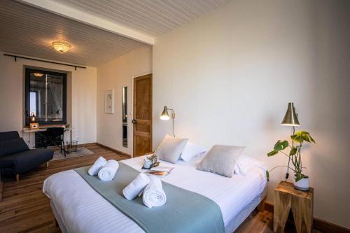Voodi või voodid majutusasutuse Résidence Hjem Petite-port Blanc - Maisons & Villas pour 4 Personnes 214 toas