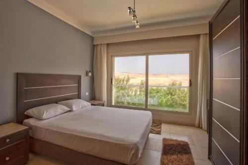 Кровать или кровати в номере Rivoli Suites