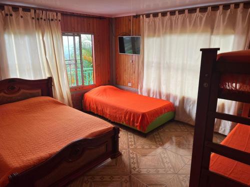 Postel nebo postele na pokoji v ubytování Eco Hotel La Selecta Pereira