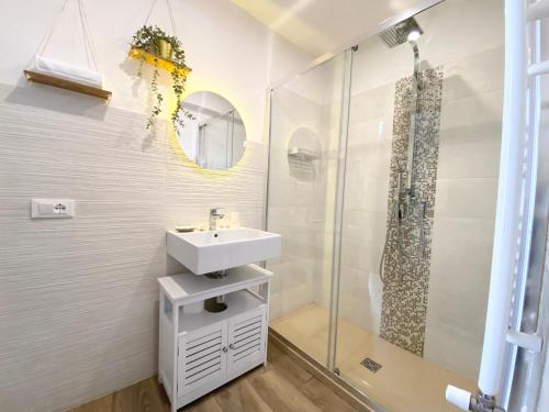 a bathroom with a sink and a shower at Stella Marina Luxury in Polignano a Mare