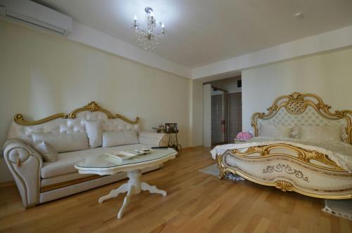 Ein Bett oder Betten in einem Zimmer der Unterkunft Hotel Park Studio Apartment Apolona