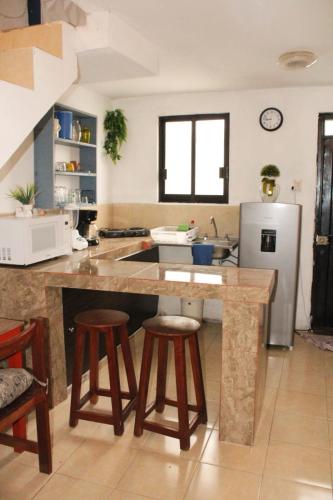 Kuchyň nebo kuchyňský kout v ubytování Casa Turrent, a 5 minutos de playa Mocambo