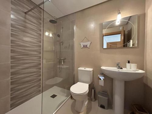 a bathroom with a toilet and a sink and a shower at Beautiful 2 Bed 2 Bath Townhouse - LA132LT in Torre-Pacheco