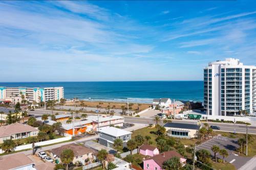 an aerial view of a city and the ocean at Ocean Holiday Motel in Daytona Beach