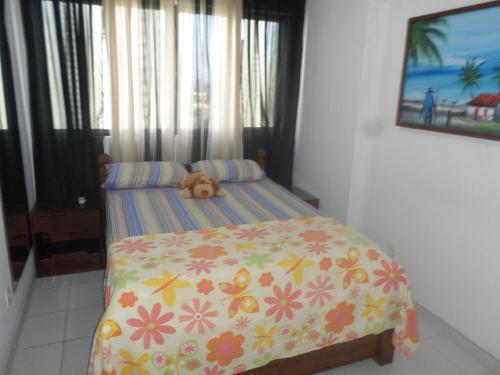Un pat sau paturi într-o cameră la Jaqueira Home Service