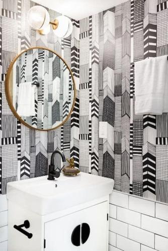 a bathroom with a sink and a mirror at Penthouse Lux in Atlanta