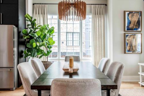 a dining room with a table and chairs at Bird's Eye View in Atlanta