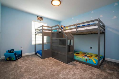 a bedroom with a bunk bed and a bunk bed at Gorgeous 4 Bedroom w Screened Pool Close to Disney 2653 in Kissimmee