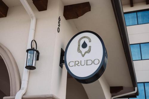 a curio sign on the side of a building at Hotel Indigo Spring - Woodlands Area by IHG in Spring