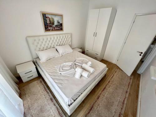 Un pat sau paturi într-o cameră la Palmas 717