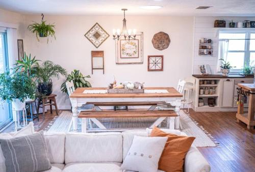 a living room with a couch and a table at Family friendly getaway in North Richland Hills