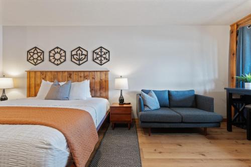 Ένα ή περισσότερα κρεβάτια σε δωμάτιο στο Duck Creek Village Inn