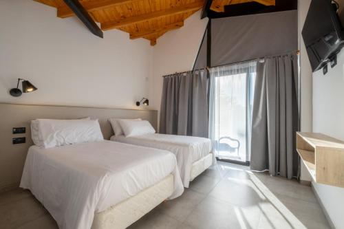 Ένα ή περισσότερα κρεβάτια σε δωμάτιο στο Bonaire Aparthotel