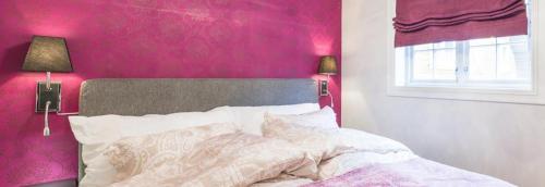 Ένα ή περισσότερα κρεβάτια σε δωμάτιο στο Boe Apartment Hotel