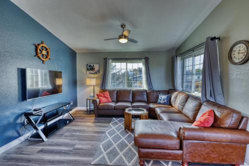 a living room with a couch and a table at Rustic Elegance 7 Bedrms 4 bath Cathedral Ceilings in Kodiak