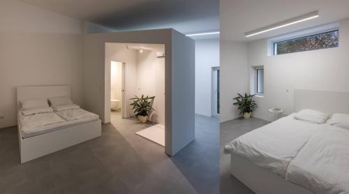 Postel nebo postele na pokoji v ubytování 4lofts Fränkische Schweiz