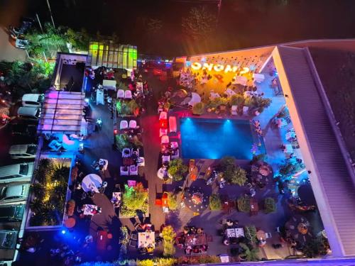 an overhead view of a lego event at night at ONOMO Hotel Kampala in Kampala