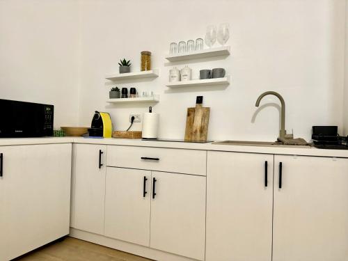 Η κουζίνα ή μικρή κουζίνα στο Central - Cozy Studio