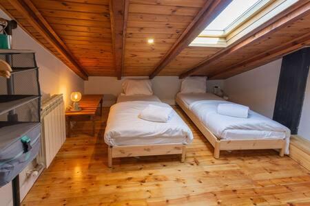 Postel nebo postele na pokoji v ubytování Apartament l'Avet