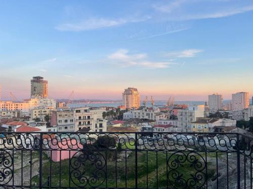 a view of a city from a balcony at Angoni Villa in Durrës