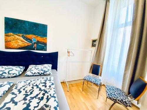 Cama ou camas em um quarto em W Rooms - Brigittenau Area MM23