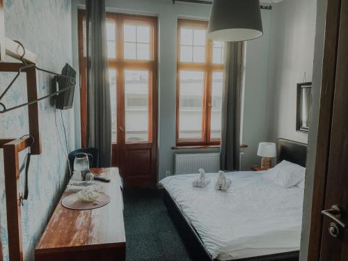 Cama o camas de una habitación en Central Sopot