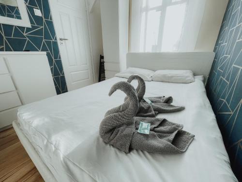 Postel nebo postele na pokoji v ubytování Central Sopot