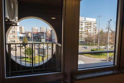 a window with a view of a city street at HOTEL BAYKO in Plovdiv