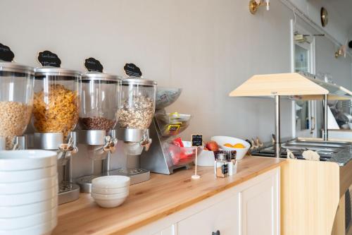 a kitchen counter with some food in containers on it at The Lanes Hotel in Brighton & Hove