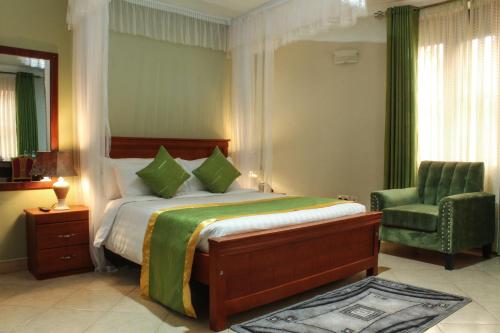 Postel nebo postele na pokoji v ubytování Excelsis Garden Hotels - Kampala