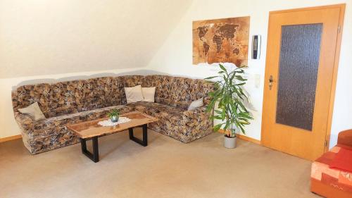 Posezení v ubytování Ferienwohnung direkt am See
