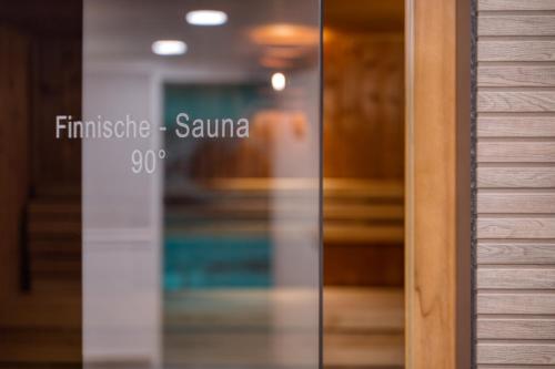 a close up of a glass door of a building at Strandgrün Golf- & Spa Resort in Timmendorfer Strand