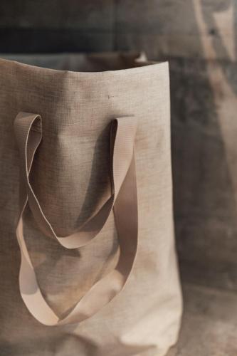 a brown paper bag sitting on top of a table at Jaunkapteiņi in Dzeņi