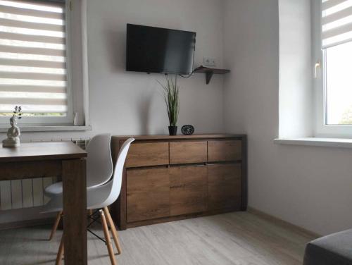 Μια τηλεόραση ή/και κέντρο ψυχαγωγίας στο Apartament Alma