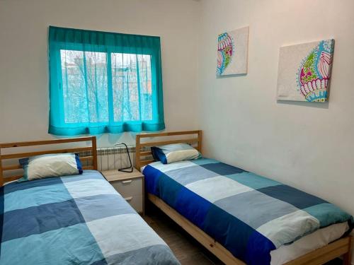 Säng eller sängar i ett rum på Céntrico apartamento bien ubicado para 5 (3 Hab) con garaje