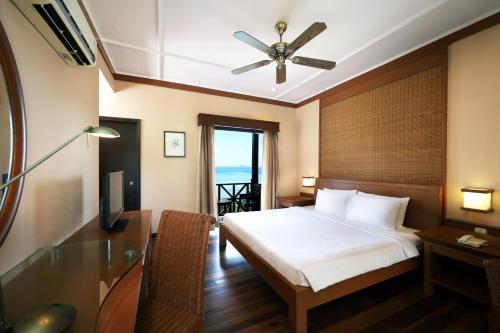 Postel nebo postele na pokoji v ubytování Redang Island Resort