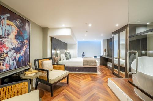 a bedroom with a bed and a living room at 34 Coney Street in York