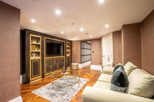 a living room with a couch and a table at 34 Coney Street in York