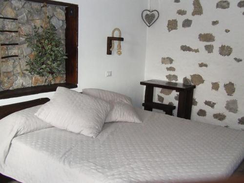 Bed and Breakfast MON AMOURにあるベッド
