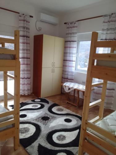 Postel nebo postele na pokoji v ubytování Bujtina Bego