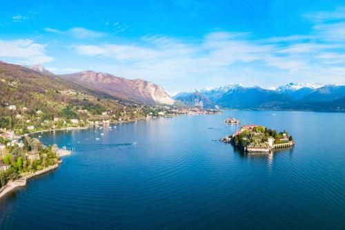 an aerial view of a small island in the water at Aparthotel Arona in Arona