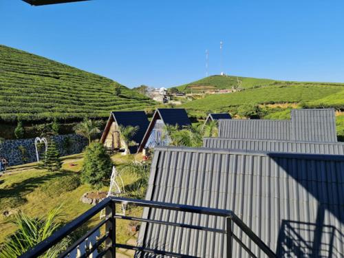 a view from the balcony of a house in a vineyard at Thung Lũng Ba Đồi Chè in Mộc Châu