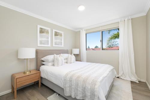 Ένα ή περισσότερα κρεβάτια σε δωμάτιο στο Waterfront Duplex 5 bedrooms 5 bathrooms