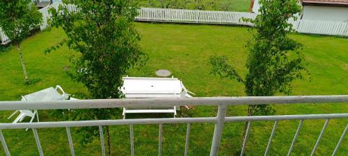 an aerial view of a yard with two trees at Hacienda Bled Rooms in Bled