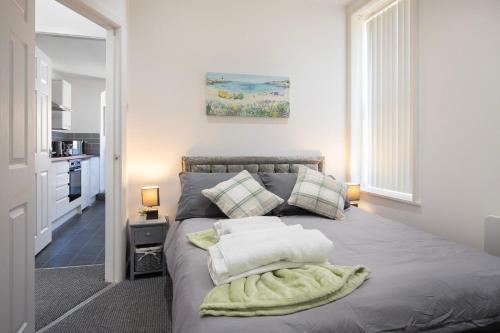 Ένα ή περισσότερα κρεβάτια σε δωμάτιο στο 02 Holmfield ( with sun terrace)