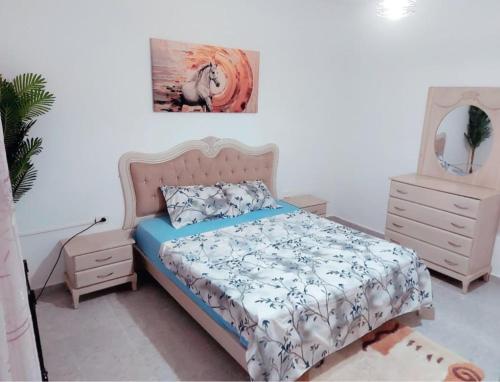 Ένα ή περισσότερα κρεβάτια σε δωμάτιο στο Blue hostellerie