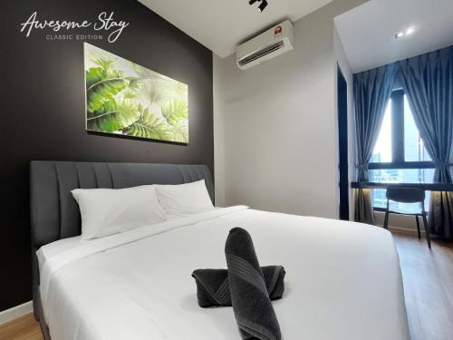Ліжко або ліжка в номері Sunway Velocity Two By Awesomestay
