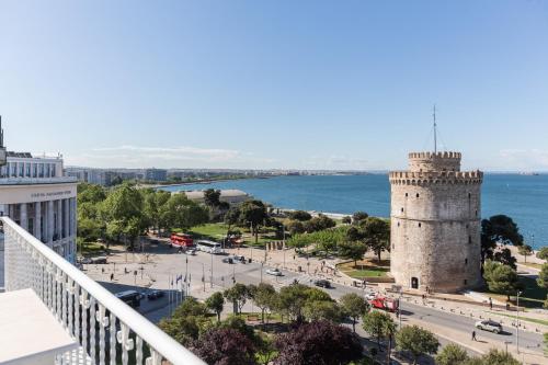 a view of a city with a castle at Aria, Lux seafront apt with White Tower view in Thessaloniki